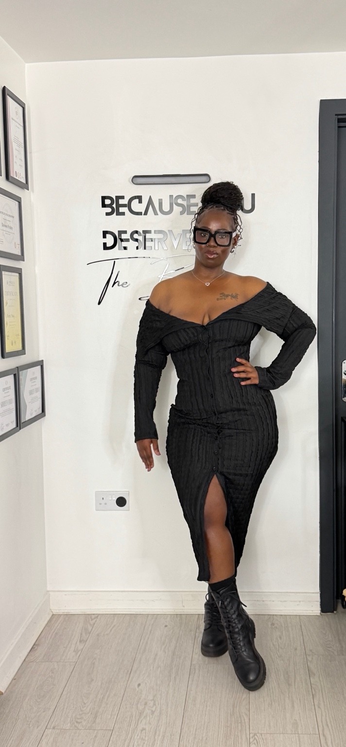 Shireen Friday, founder of NTA Beauty Studio, standing inside her private studio
